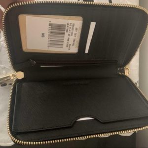 Michael Kors wristlet, never used